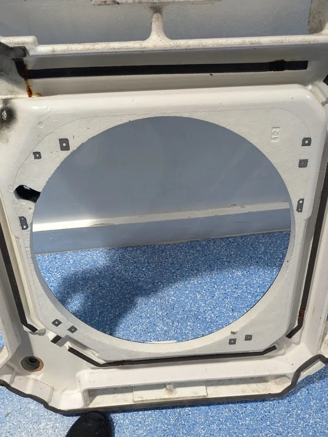 Ceiling cassette drain pan after cleaning, with deposits removed