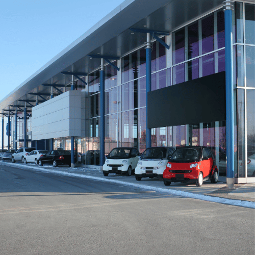 Modern car dealership showroom with climate control